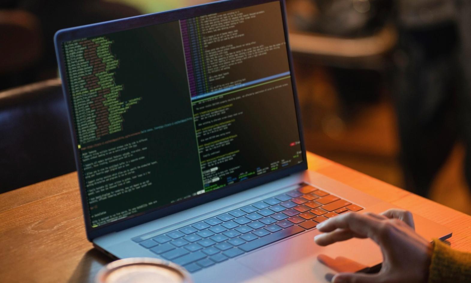 Mobile game development workspace showing multiple screens with game interfaces and code